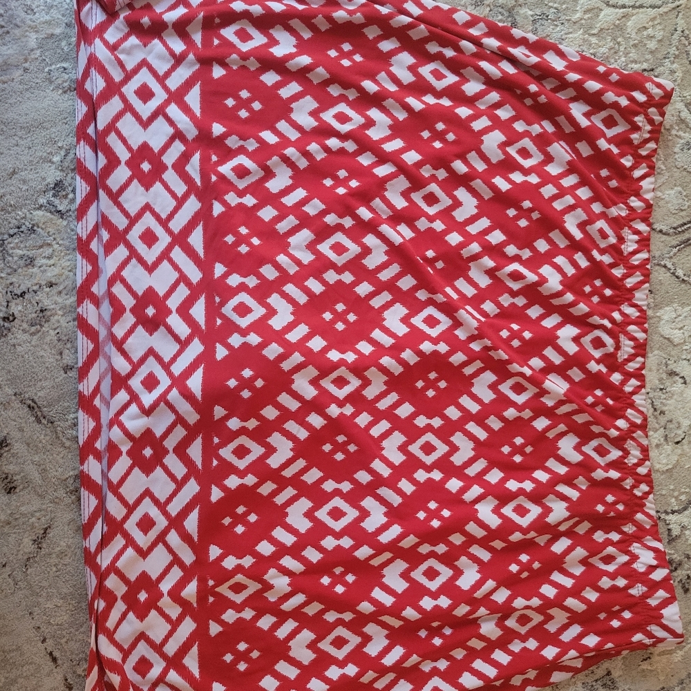 Adorable and super comfortable red and white batik silky knit skort. 18" length.